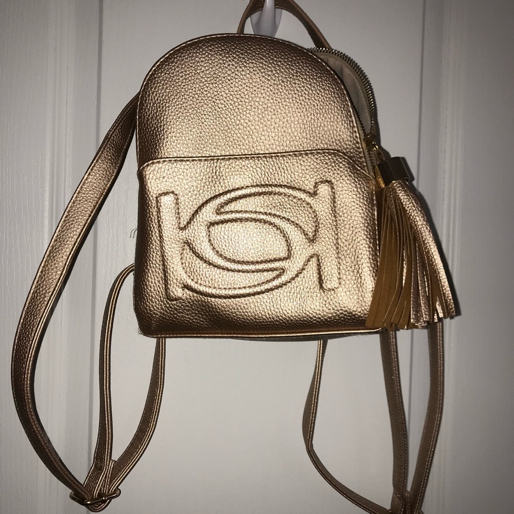 BEBE mini backspace in gold/rose gold